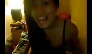 low-spirited asian girl making out in the air your dormroom