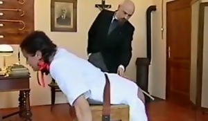 Perverted headmaster caning his teen student