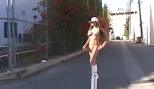 Big tits blonde Shay Lynn heads nude on Los Angles public nakedness borough street