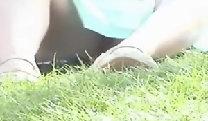 upskirt gal at be transferred to greens shows wet crack